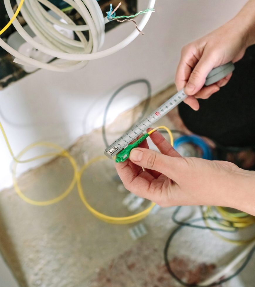 telecommunications-installer-measuring-fiber-optic-2026-01-08-22-46-11-utc-scaled.jpg